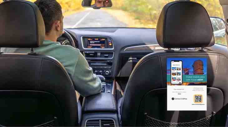 A flyer with a QR code is promoting ConnectedYou eSIMs. It's attached to the back of a car seat, as part of the Taxi eSIM Affiliate Program.